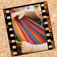 vier bilder mit unterschiedlichen Motiven baby im Tragetuch, Kirschblüten, Windeln, Kinderwagen